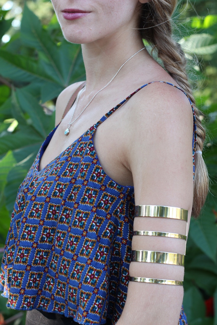 crop top and gold arm band