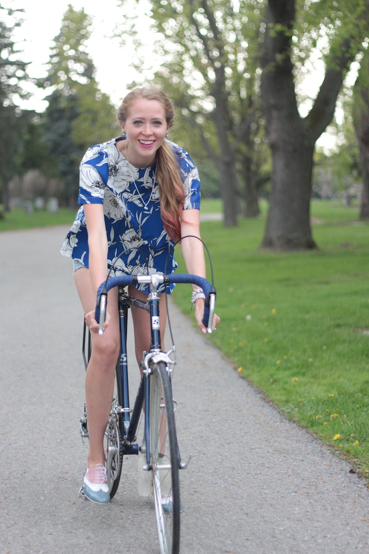 girl riding road bike levi's 501 shorts