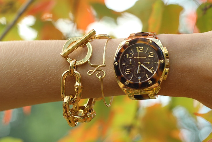 gold and tortoiseshell michael kors watch