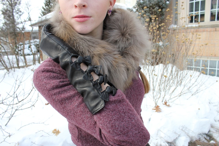 long gloves with bows and fox fur scarf