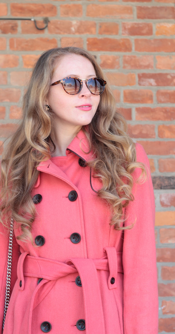 pink coat tortoiseshell sunglasses