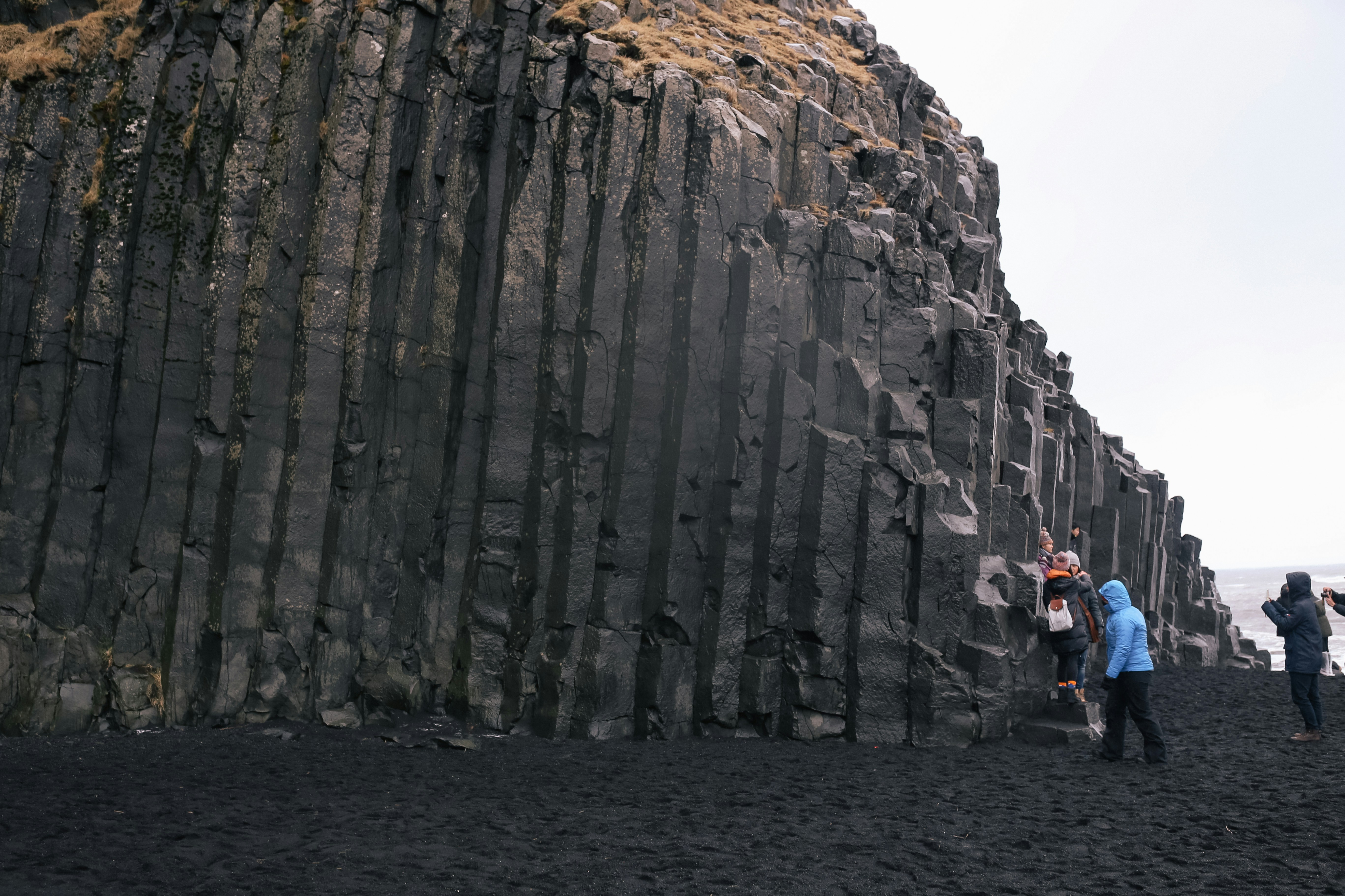 Southern Iceland Vik Travel Itinerary: Impressive basalt columns at Reynisfjara Beach aka Iceland's black beach. 