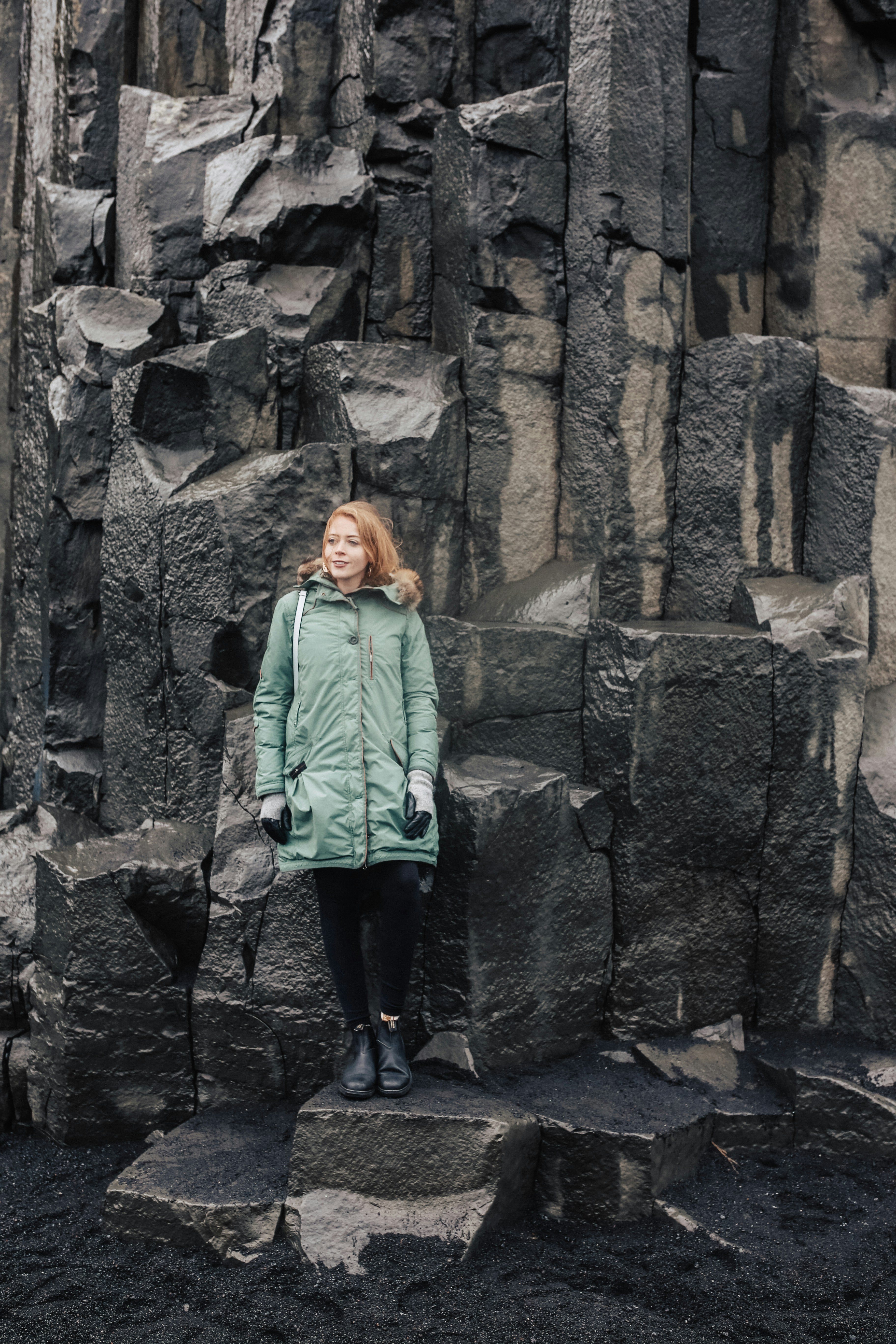 Exploring the infamous Reynisdrangar basalt sea rocks at Reynisfjara Beach in South Iceland.