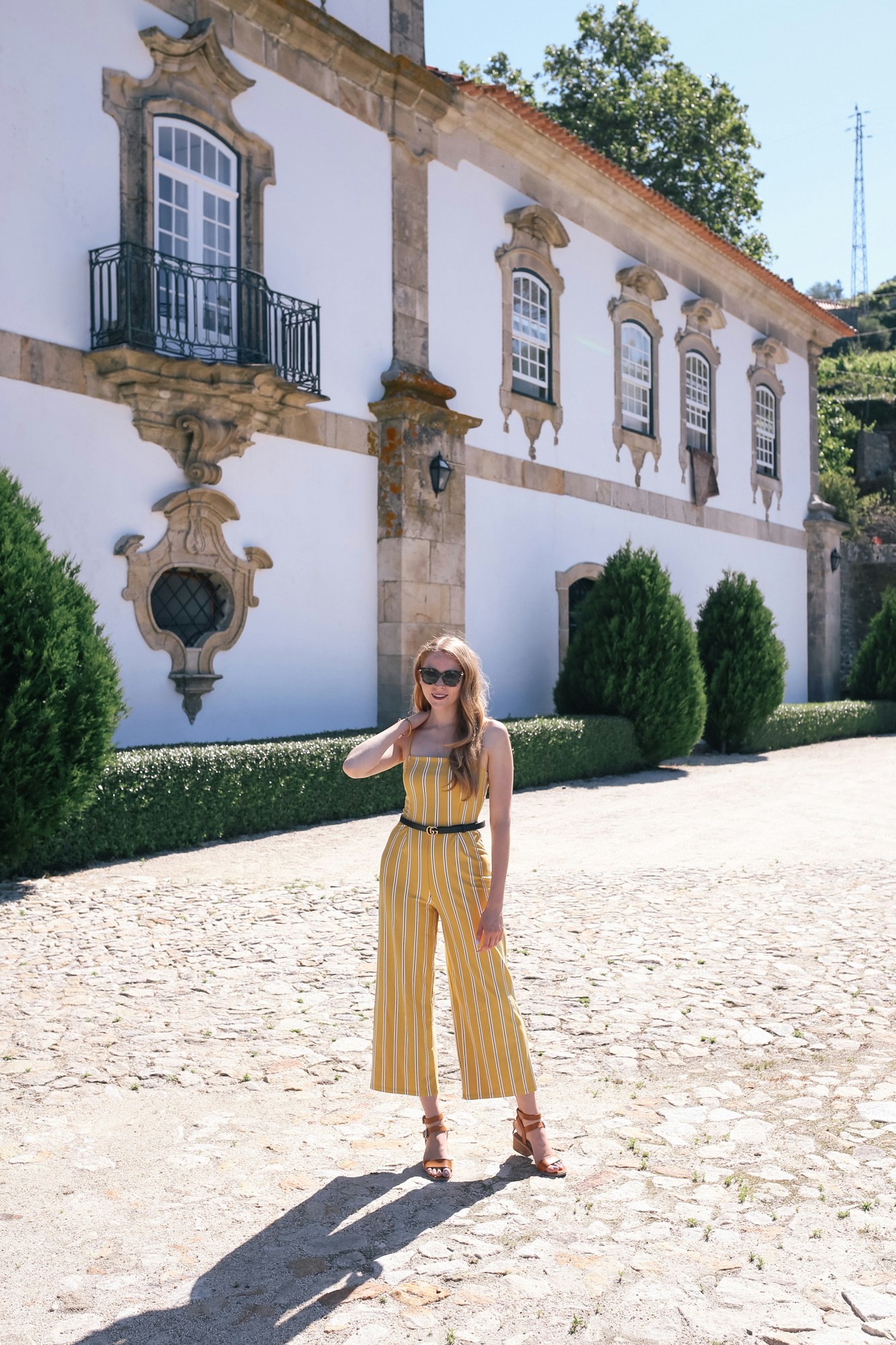 yellow striped jumpsuit with gucci marmont belt