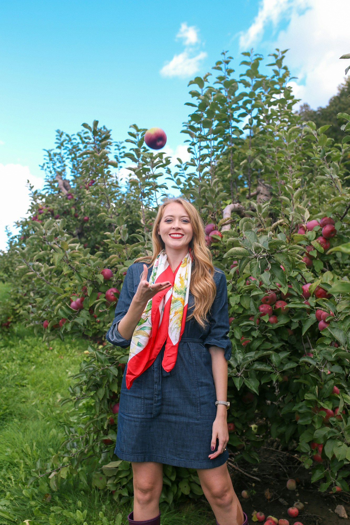Apple picking outfit idea: denim dress and silk scarf