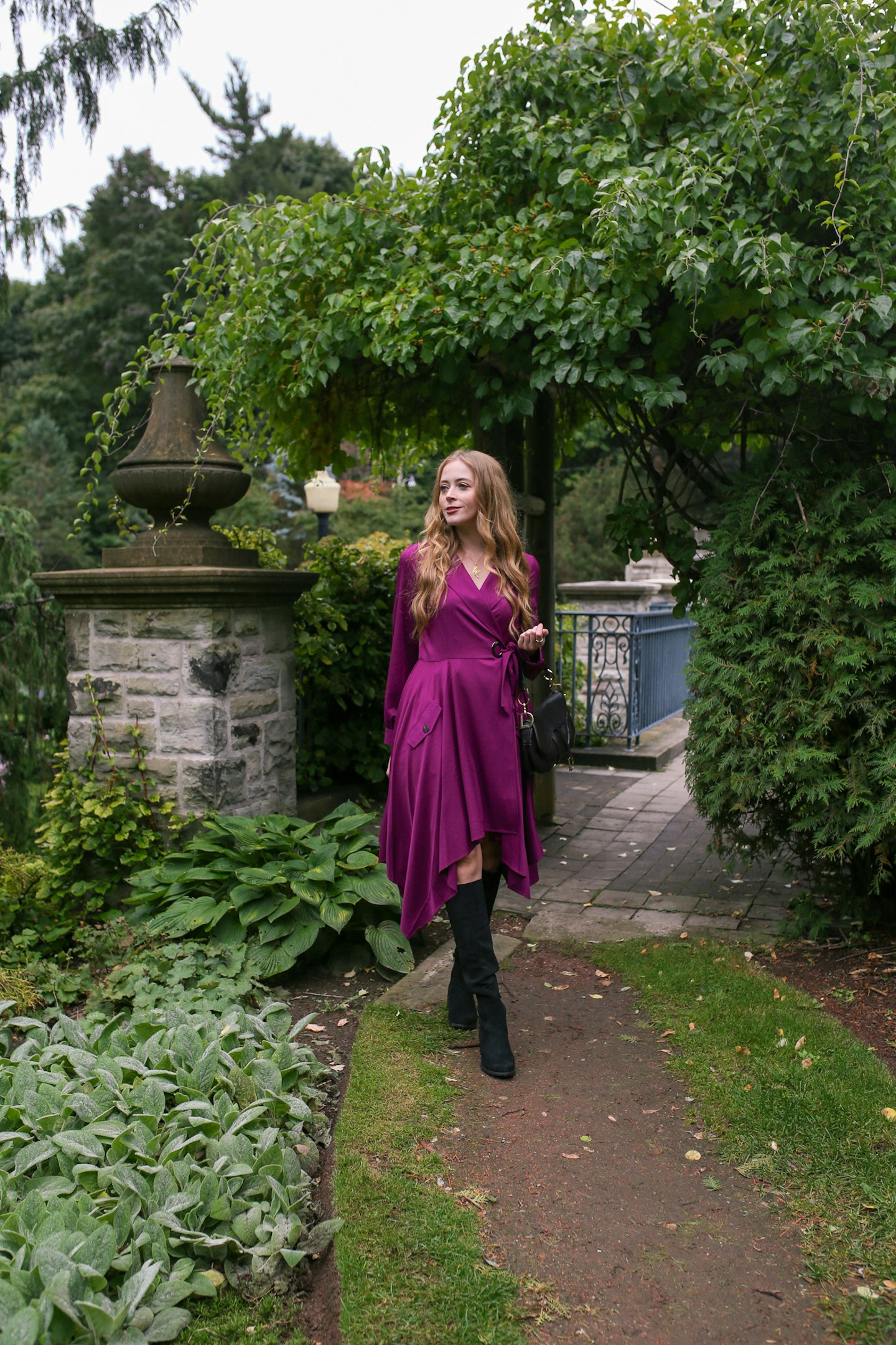 How to wear tall black boots with a dress: styled a pair of Unisa Indyia over the knee boots with a Chriselle Lim Wren Trench dress for a chic fall look perfect for a concert or date night.