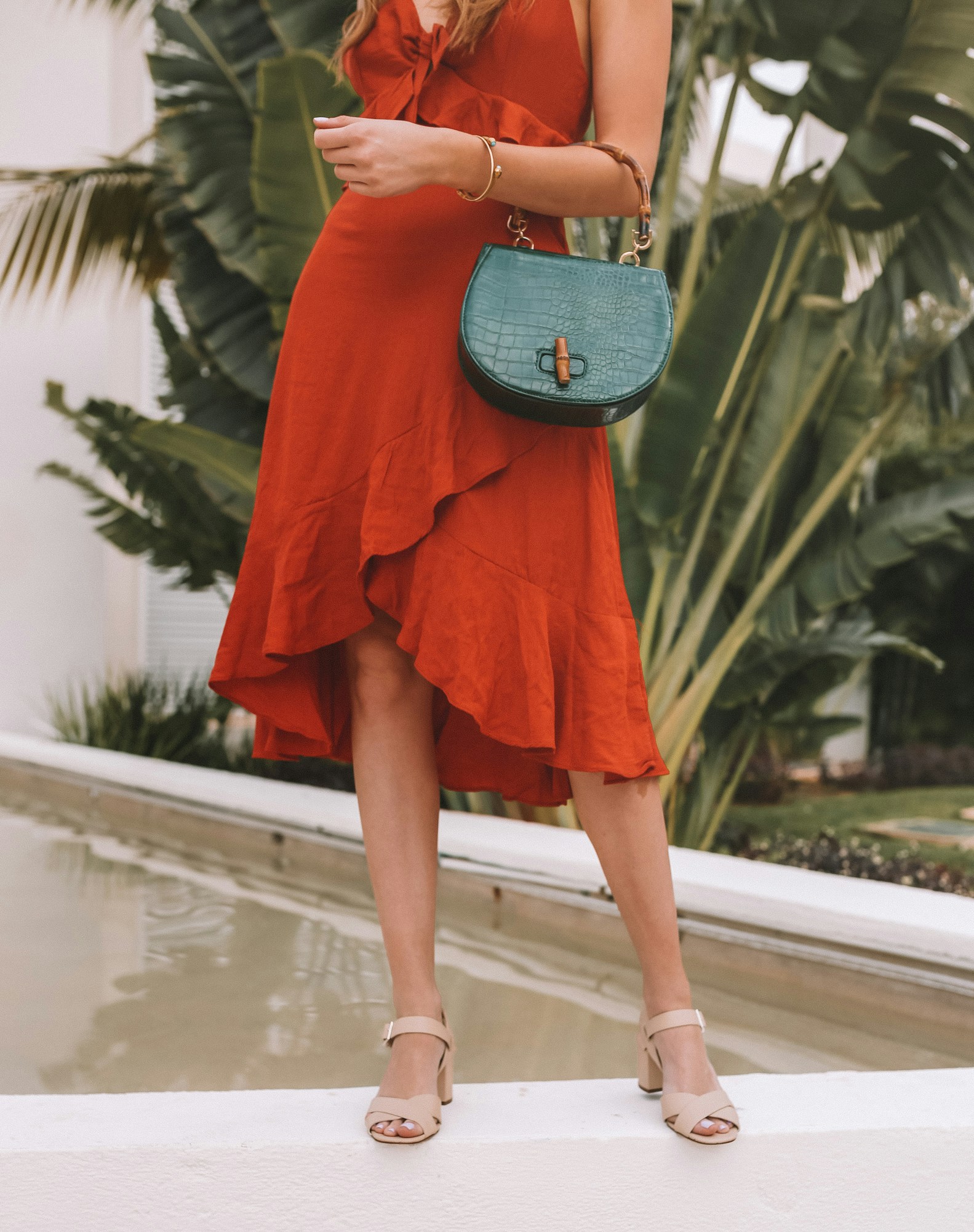 Forever 21 green faux croc bag with a bamboo handle, orange linen dress and cream leather sandals.