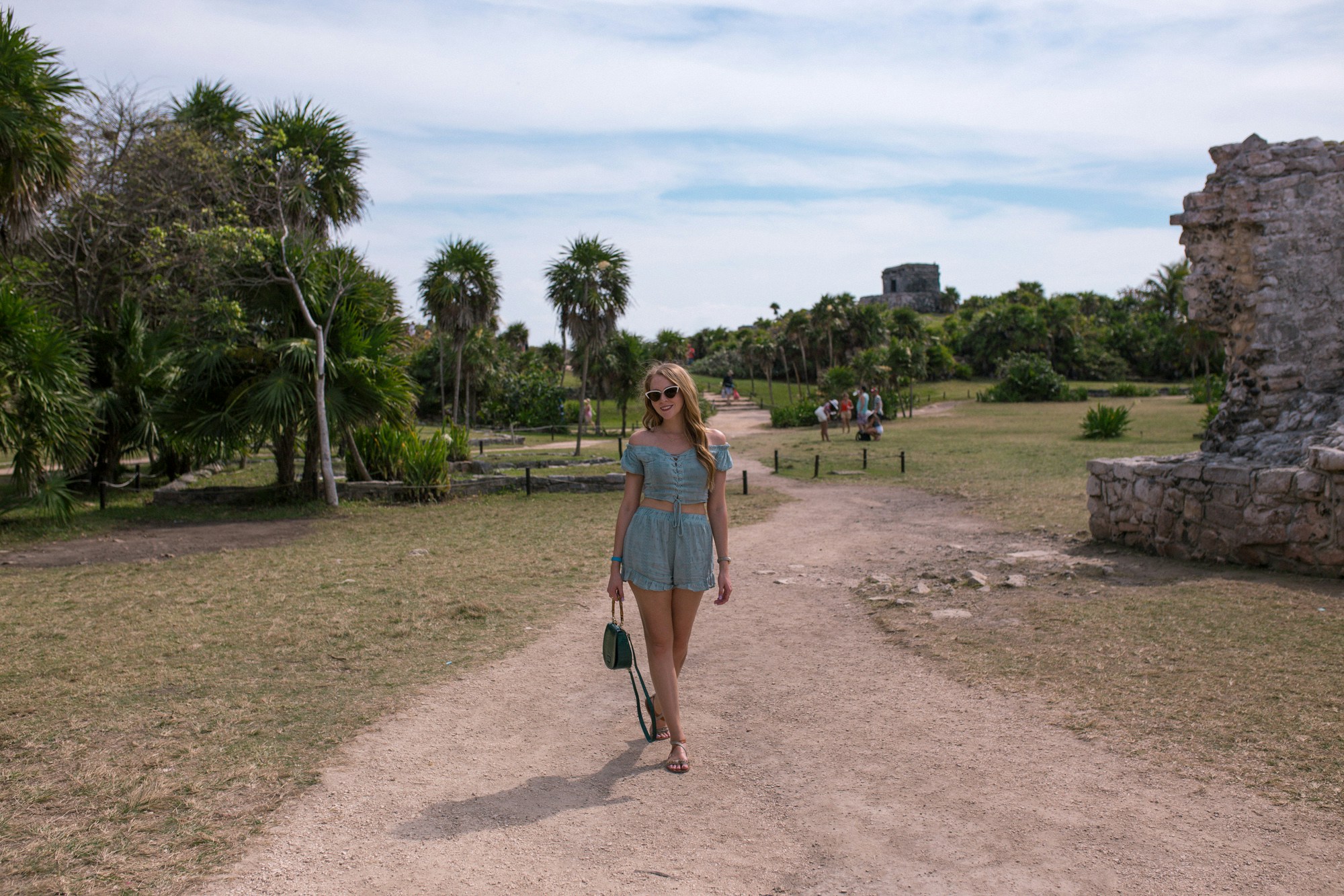10 Helpful Tips for visiting Tulum - dress light and bring sunscreen, water and a towel. I wore this light two-piece set from Forever 21 and leather sandals to stay cool. 