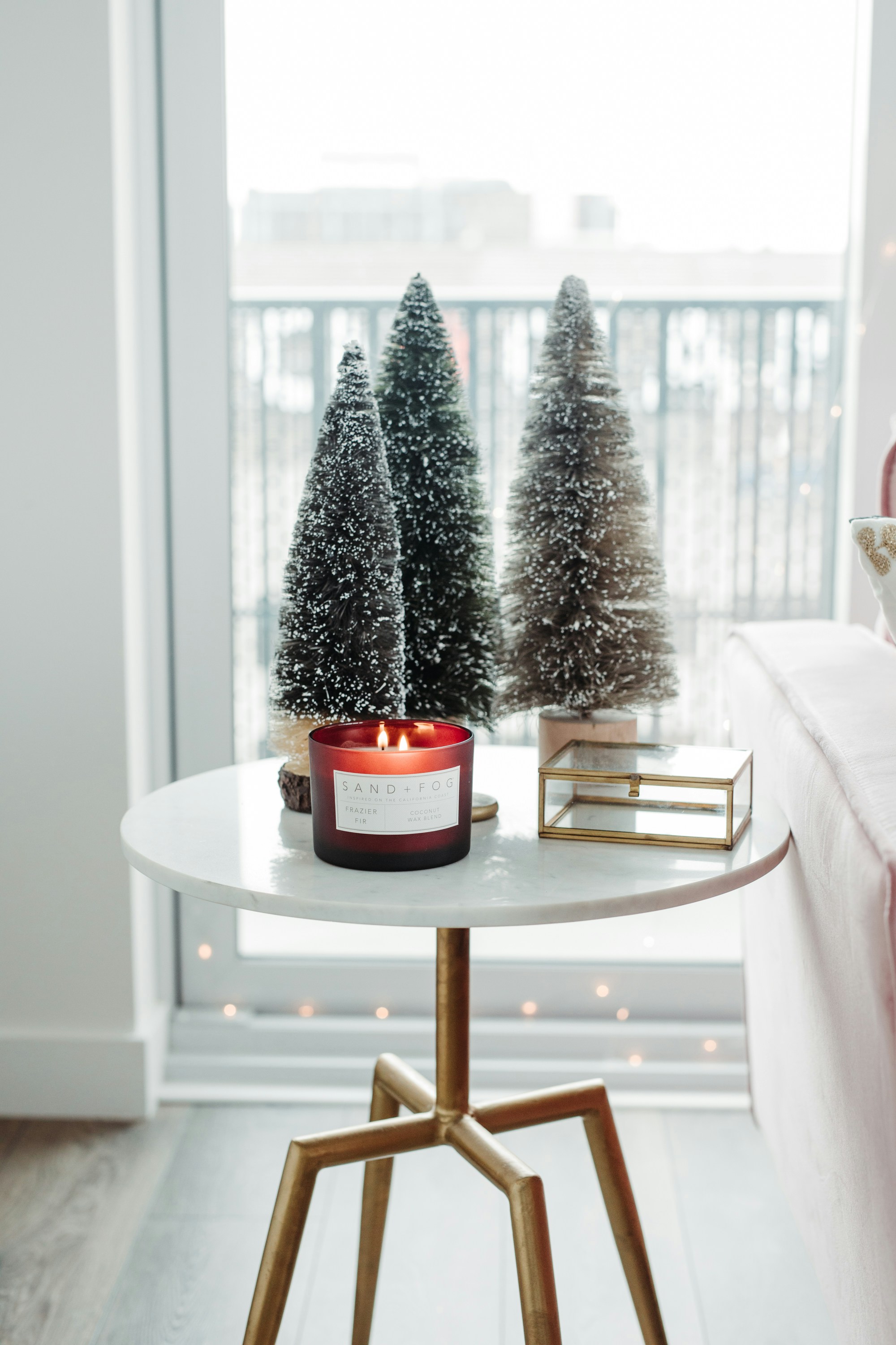 Bottlebrush trees and a Sand + Fog candle are a classic Christmas mainstay!