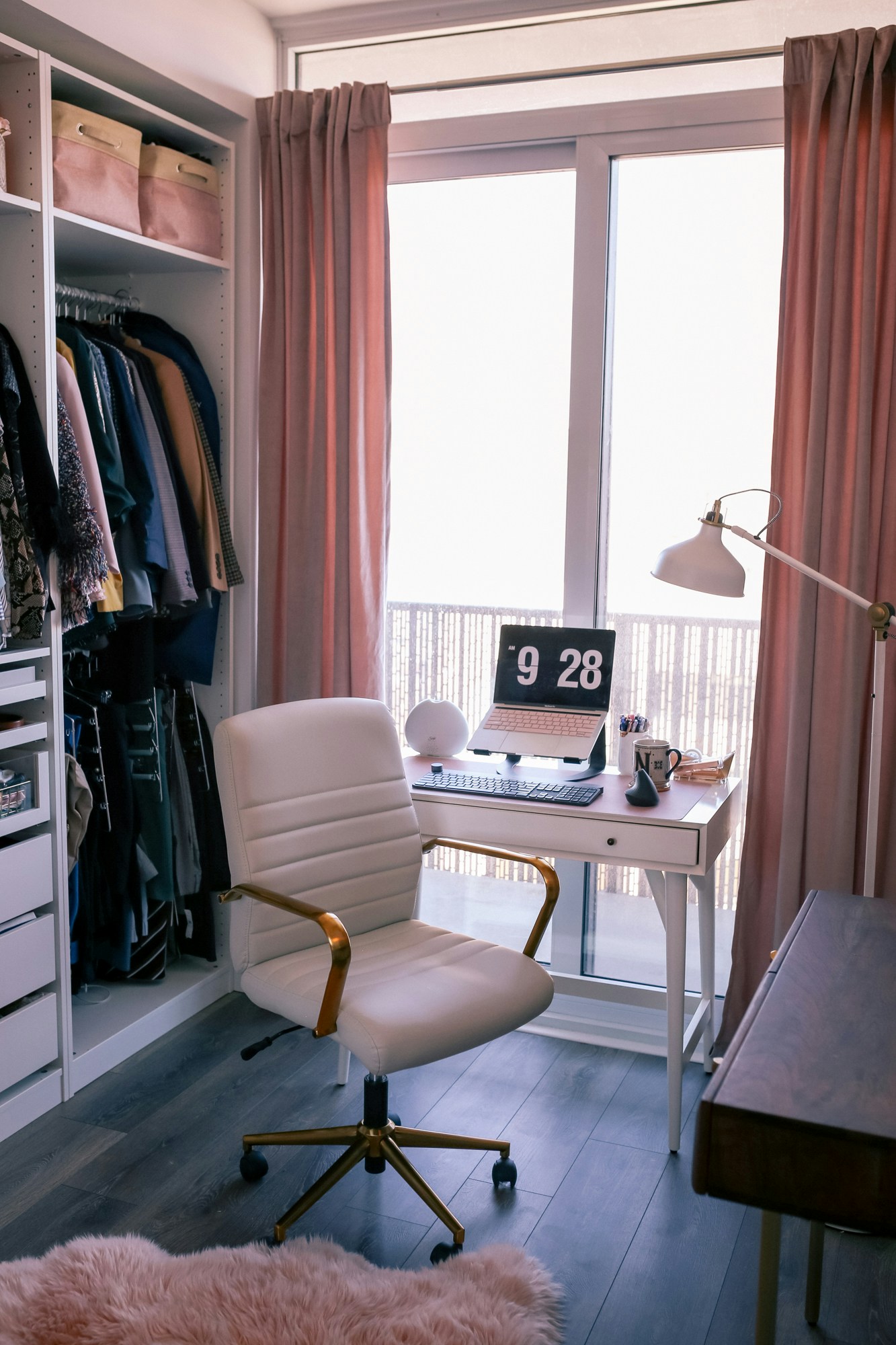 Home Office Decor Tips: Creating a serene space for productivity during self-isolation. West Elm Mid-Century Desk, IKEA Pax wardrobe & a gold desk chair complete the look.