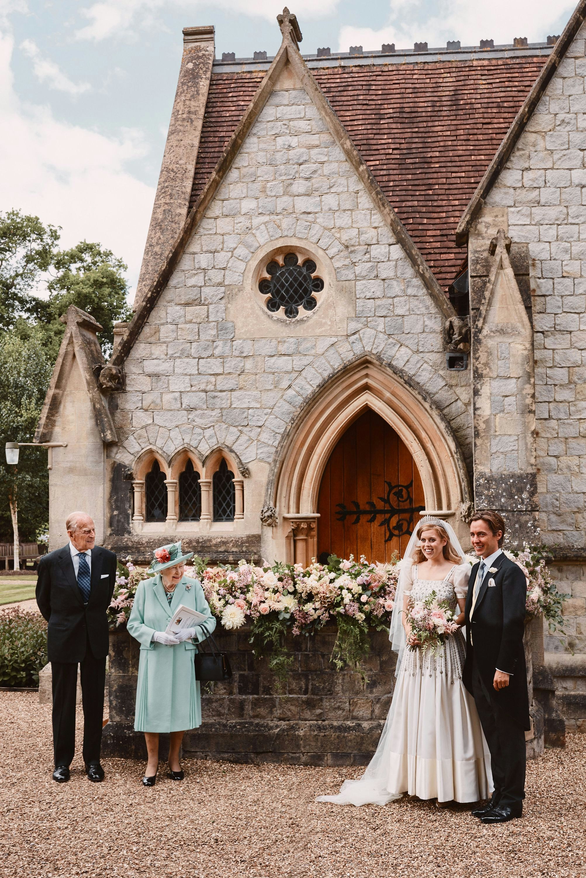Queen Elizabeth, Prince Phillip stand socially distanced from Princess Beatrice and Edoardo Mapelli Mozzi on their wedding day
