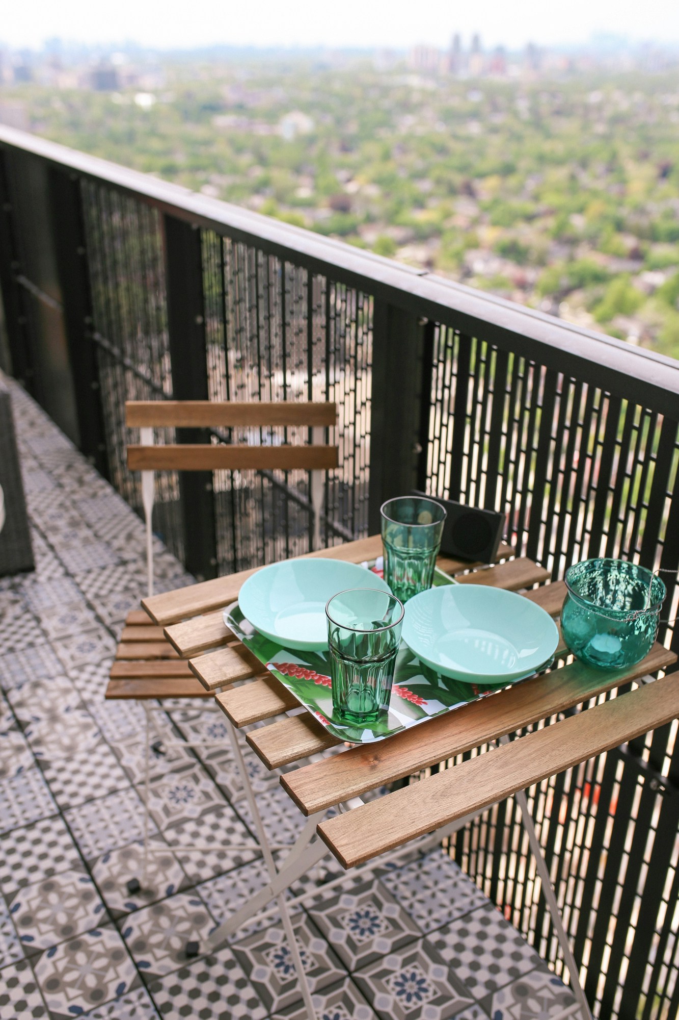 The IKEA Tärnö Bistro Set is a classic cheap and chic option for small spaces. I love that it folds up and makes for the perfect dining area on my balcony.