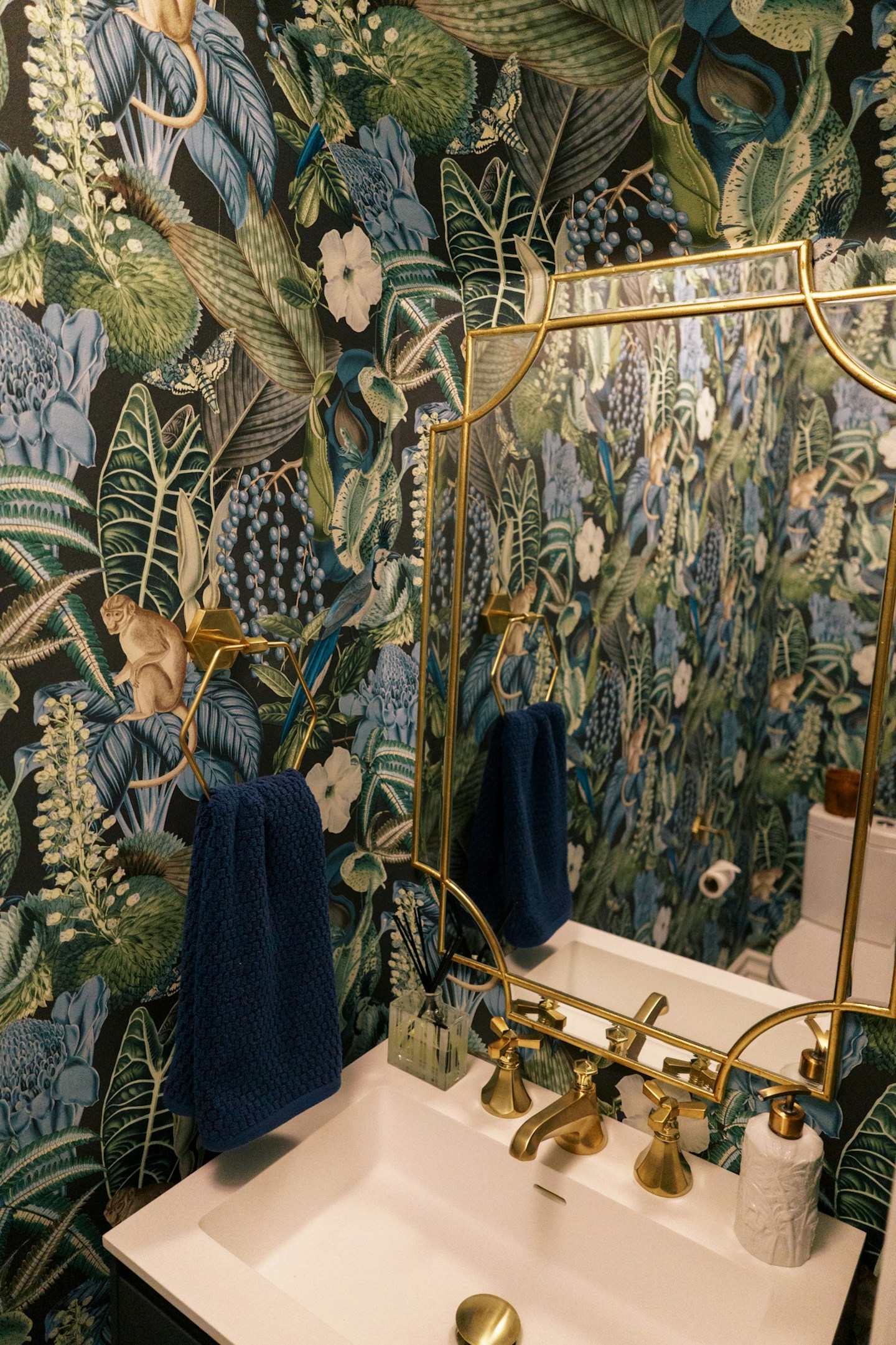 Tropical bird wallpaper - Amazon by Albany from Wallpaper Direct is a moody exotic wallpaper that will transform your powder room bathroom or any other space.